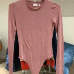 Featured thumbnail for Body suit