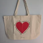 Featured thumbnail for Sézane "Bonjour l'Amour" cotton tote bag
