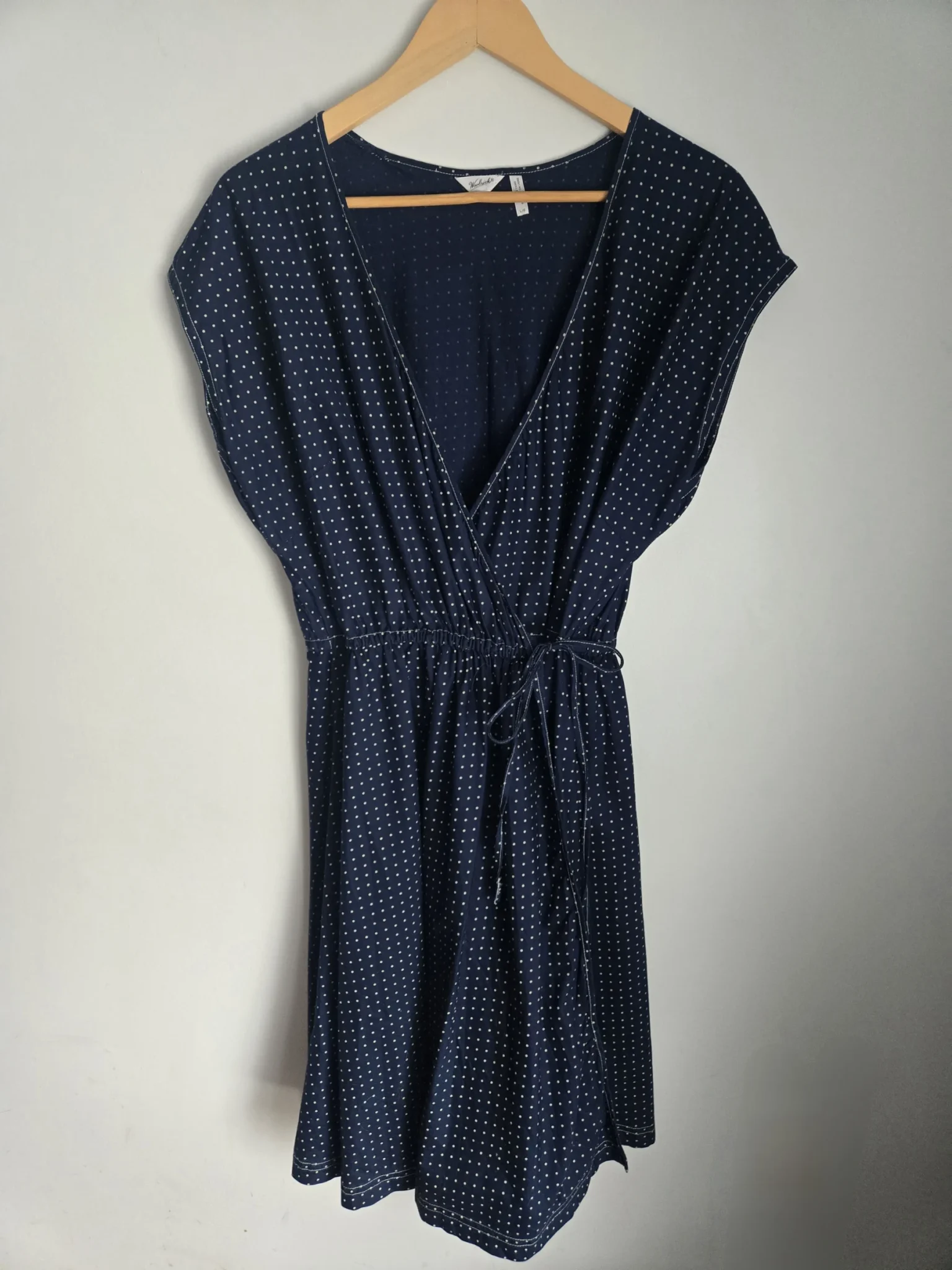 Featured image for Navy polka dot wrap dress
