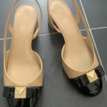 Featured thumbnail for Michael Kors nude and black slingback pumps Size 6
