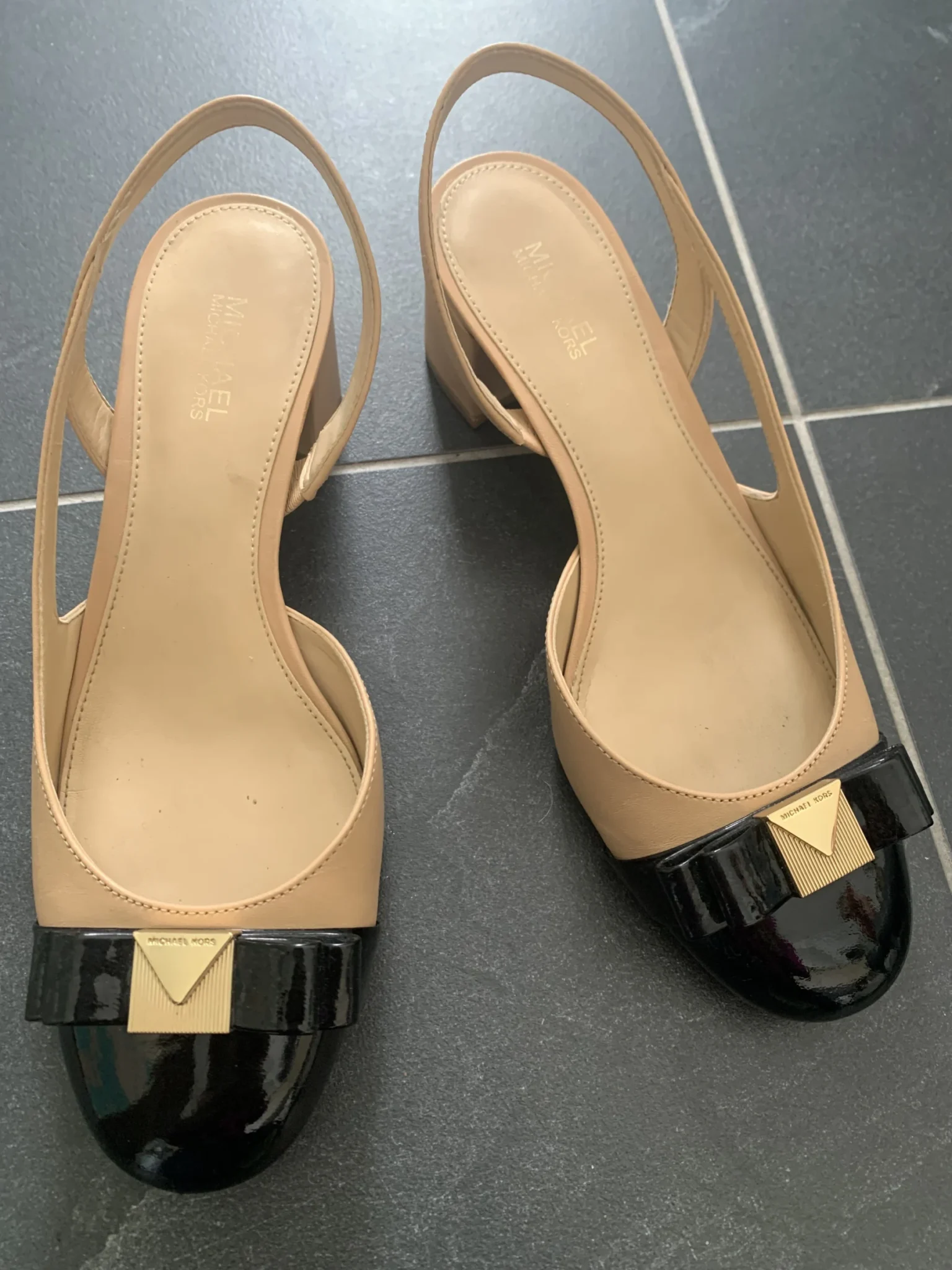 Featured image for Michael Kors nude and black slingback pumps Size 6