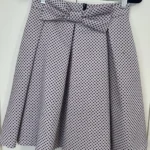 Featured thumbnail for Pale pink and black polka dot and bow skirt - Tristan size 2(Xs/s)