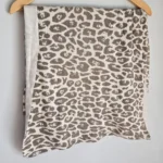 Featured thumbnail for Animal print knitted neck warmer