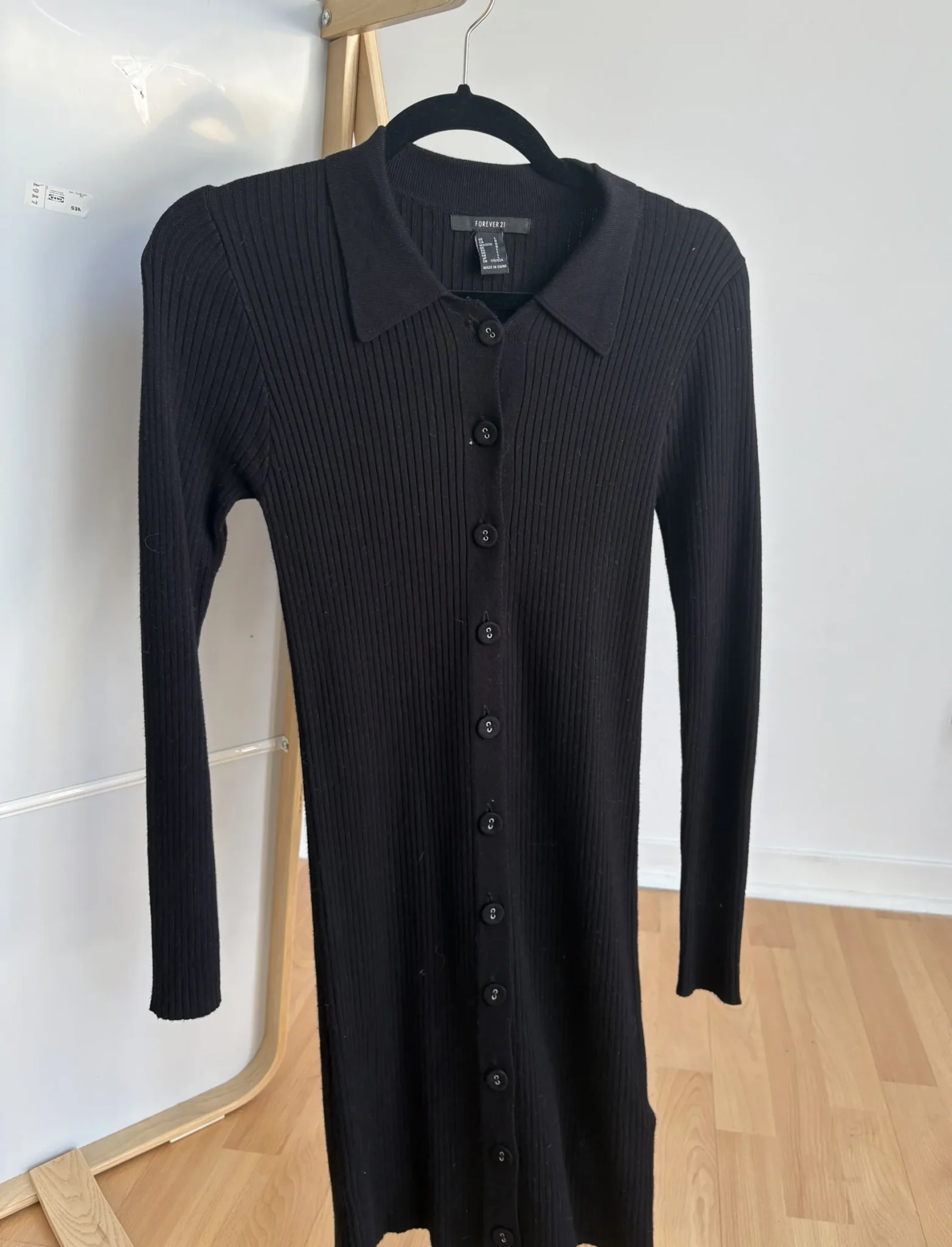 Featured image for Black button-down sweater-dress