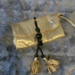 Thumbnail for Golden pouch