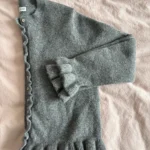 Featured thumbnail for Cardigan with ruffles