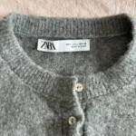 Thumbnail for Cardigan with ruffles