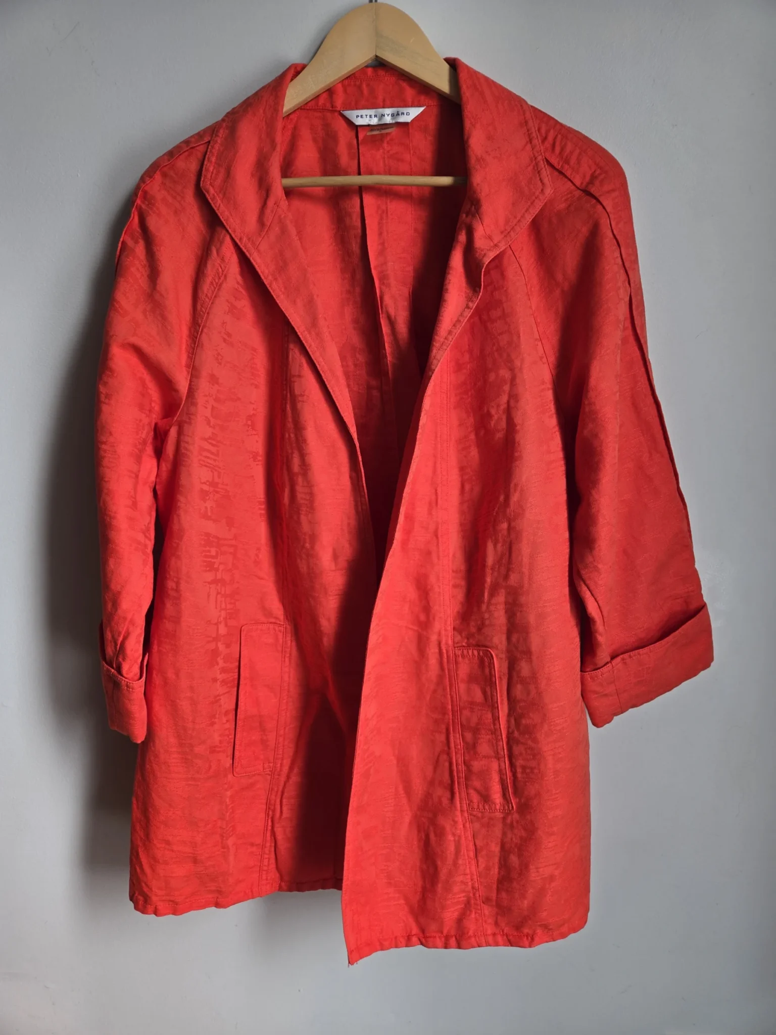 Featured image for Coral-red spring jacket
