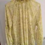 Featured thumbnail for Blouse bouffante semi-transparente