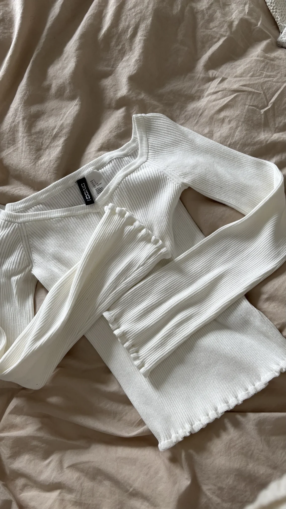 Featured image for Haut en tricot blanc