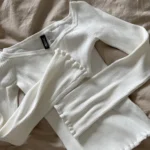 Featured thumbnail for Haut en tricot blanc