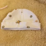 Featured thumbnail for Tuque  « Winnie l’ourson » Disney bébé naissant unisexe 0-6