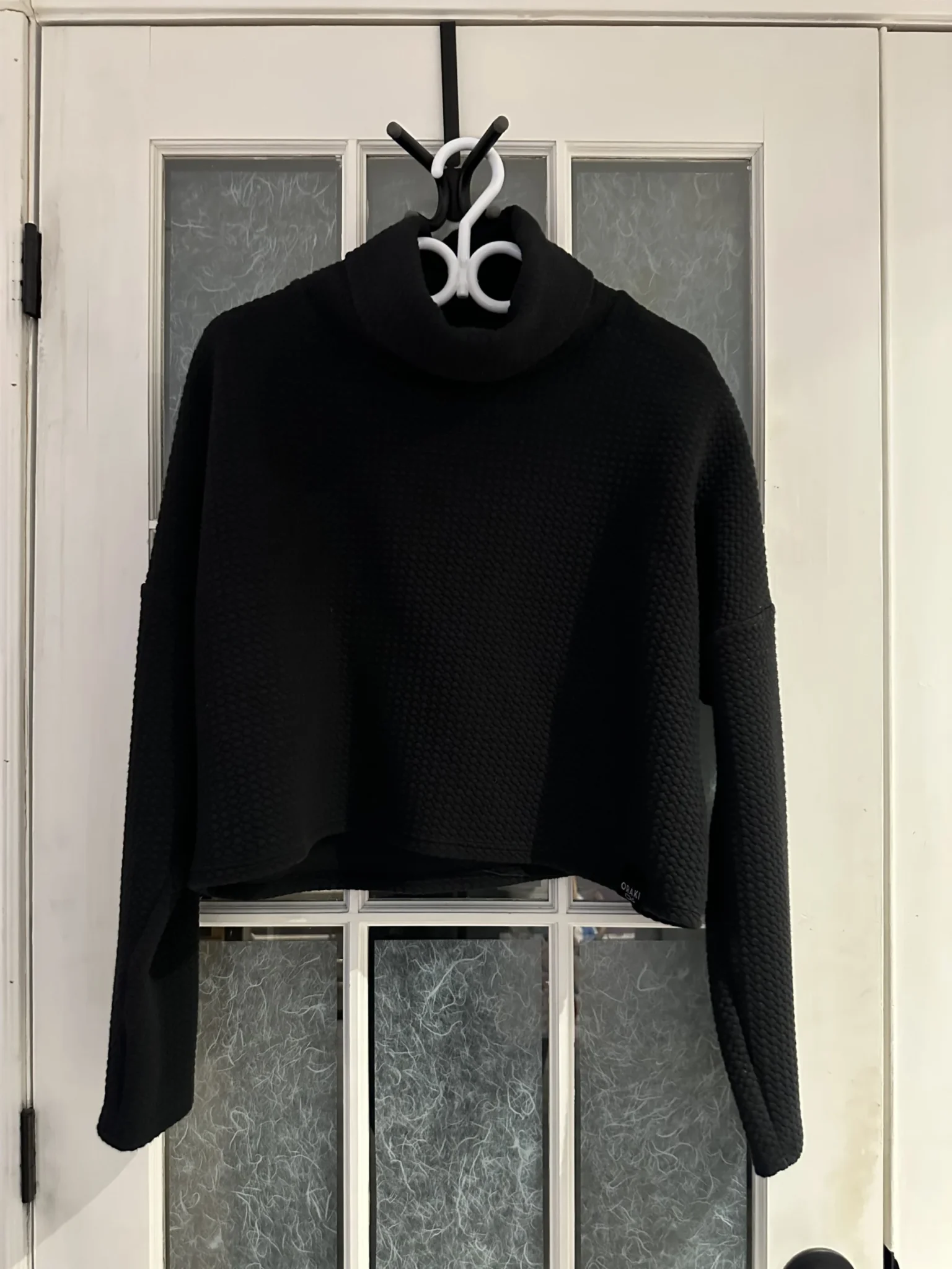 Featured image for Oraki black jumper