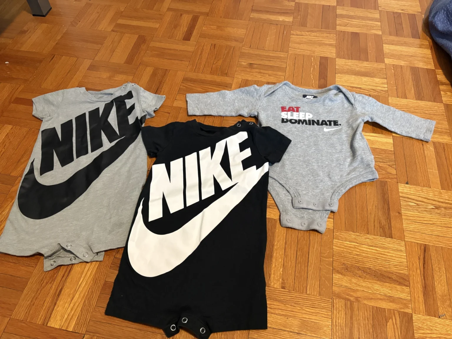 Featured image for Nike onesie trio