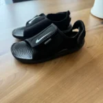 Featured thumbnail for Nike black sandals