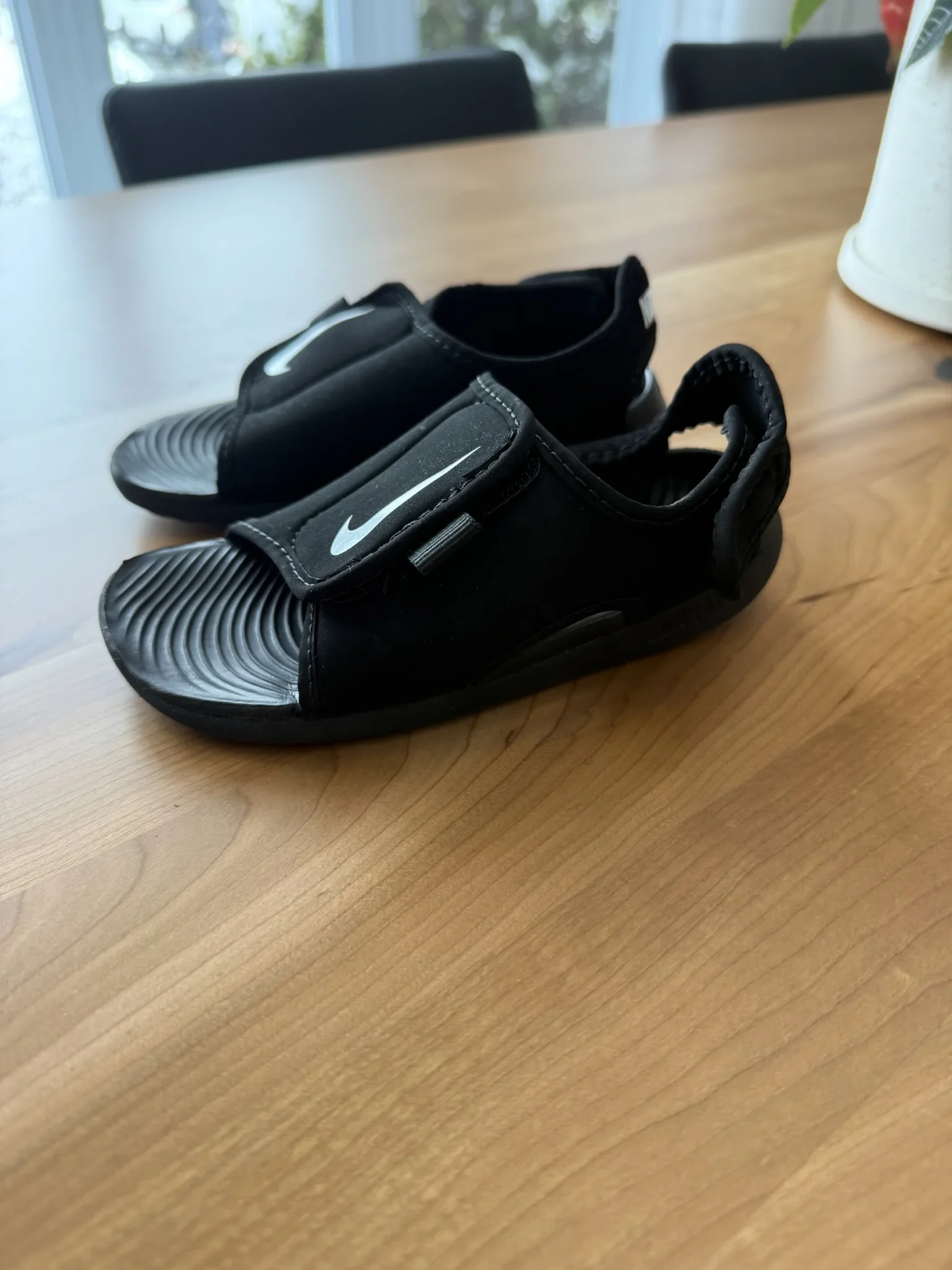 Featured image for Nike black sandals