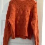 Featured thumbnail for Orange knitted jumper