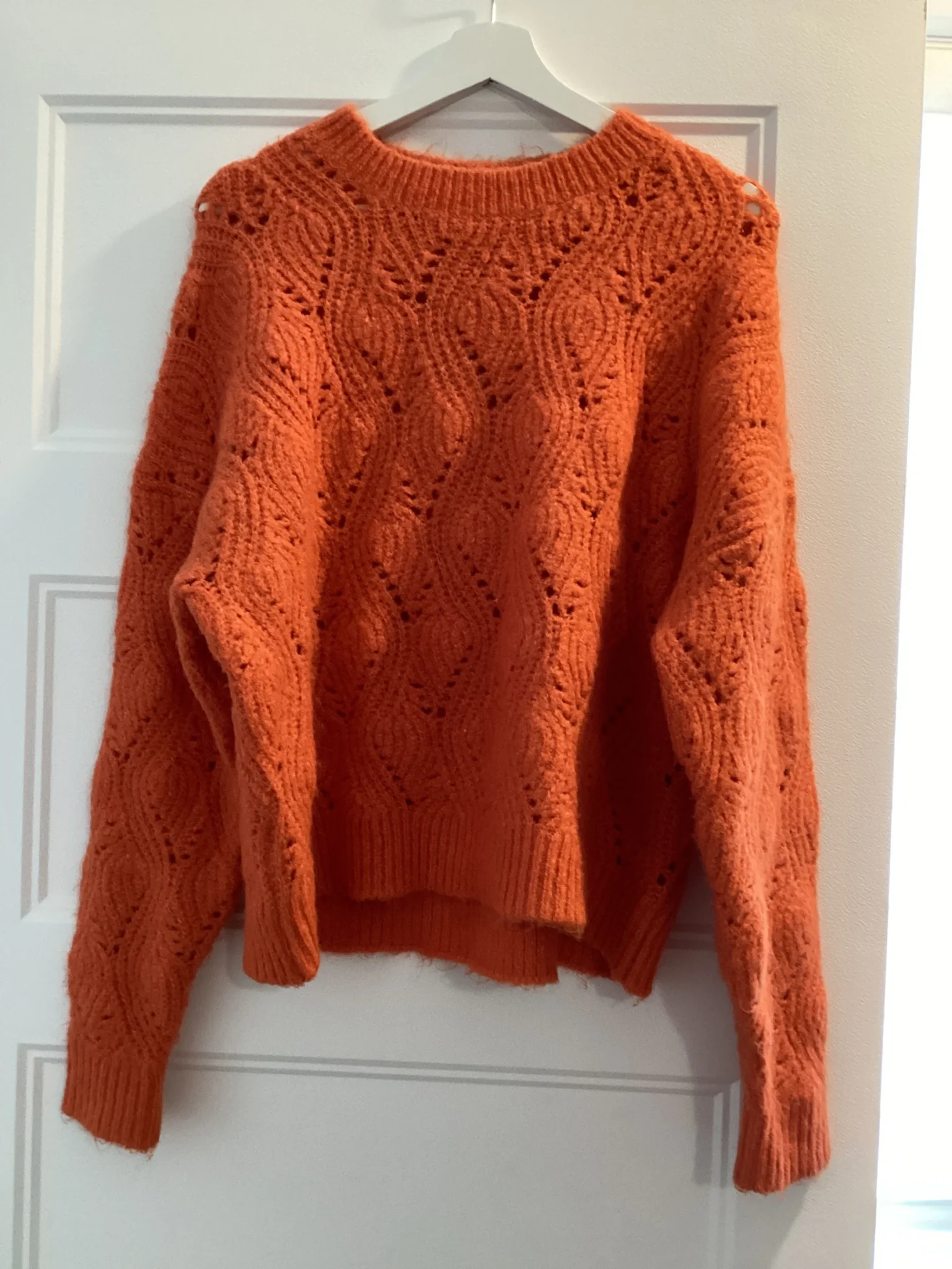 Featured image for Orange knitted jumper