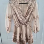 Featured thumbnail for Romper paillettes