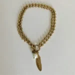 Thumbnail for Collier pendentif plume et perle or court ou long