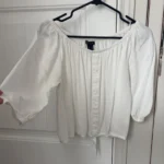 Featured thumbnail for Blouse epaules découvertes