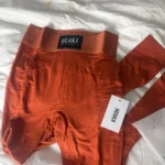 Featured thumbnail for Legging Hoaka orange brulé jamais porté