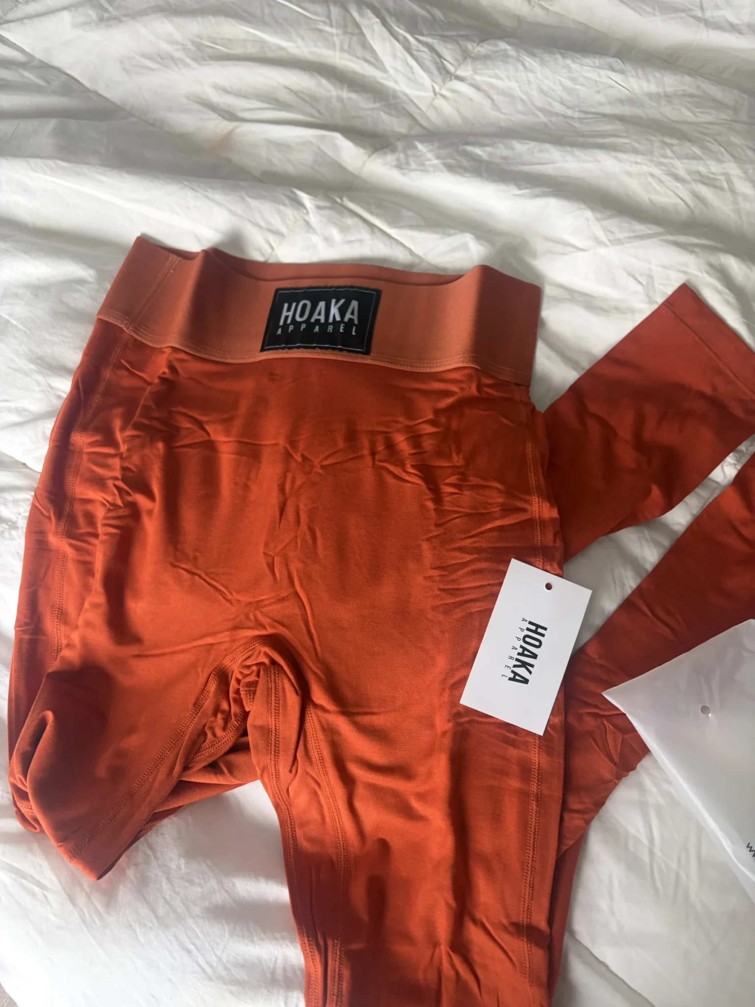 Featured image for Legging Hoaka orange brulé jamais porté