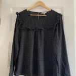 Featured thumbnail for Black blouse with white polka dots