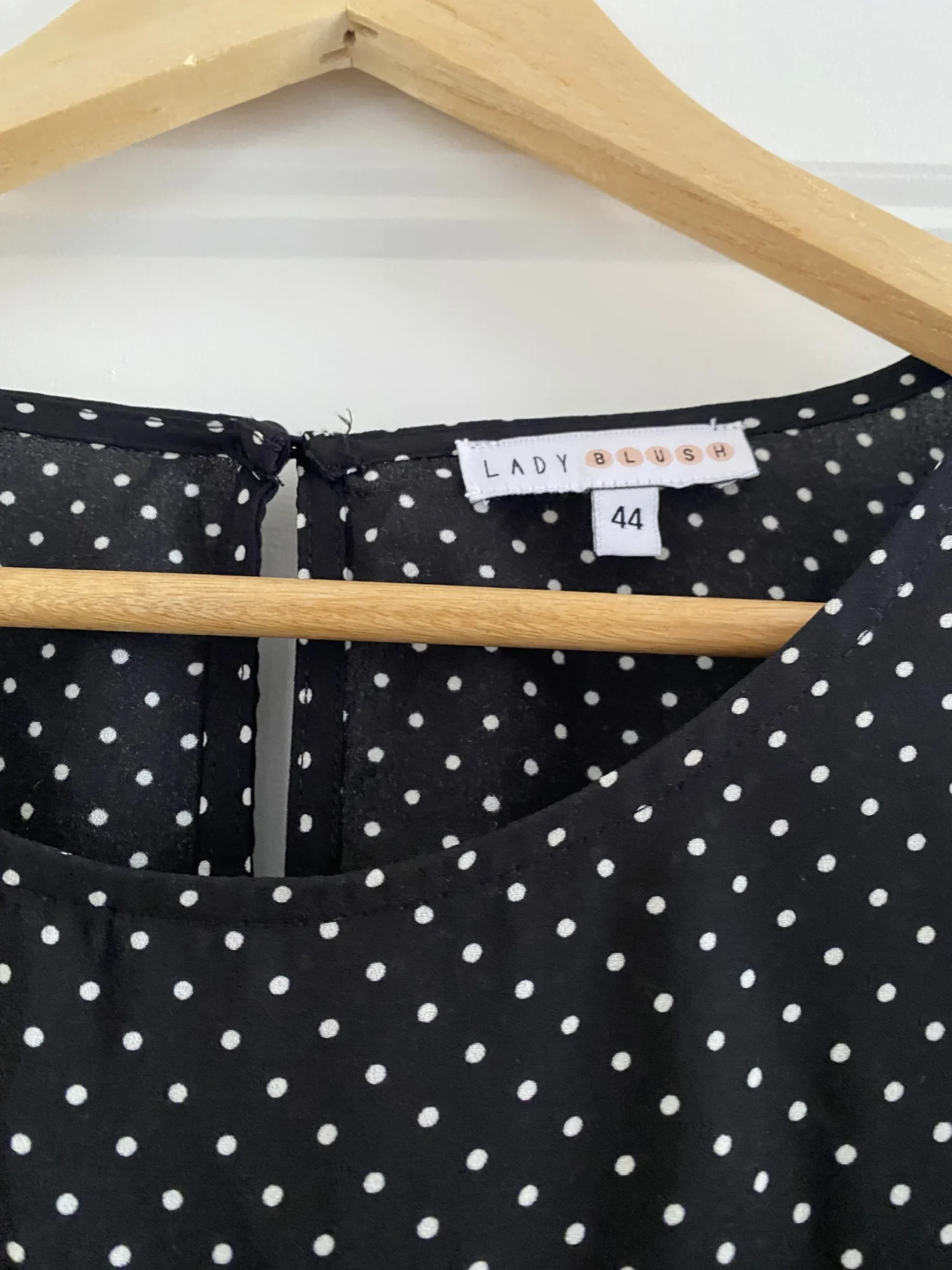 Image for Black blouse with white polka dots