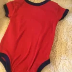 Thumbnail for Cache couche football basketball bébé unisexe 6-9