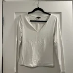Featured thumbnail for White long-sleeved jumper