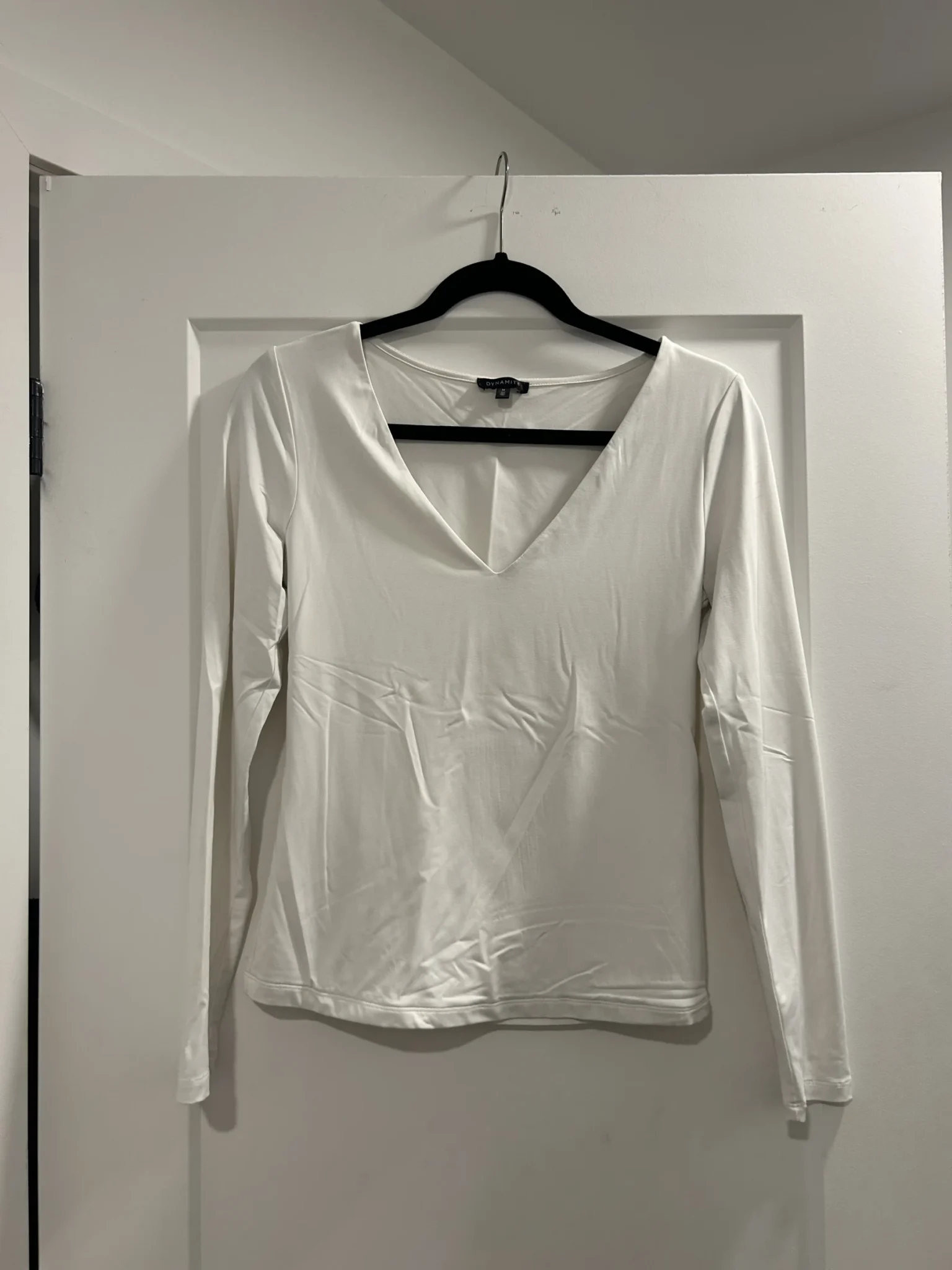 Featured image for White long-sleeved jumper