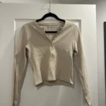 Featured thumbnail for Long-sleeved Henley jumper