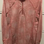 Featured thumbnail for Haut technique Kirkland Signature Demi-Zip – Corail – Taille Médium (M)