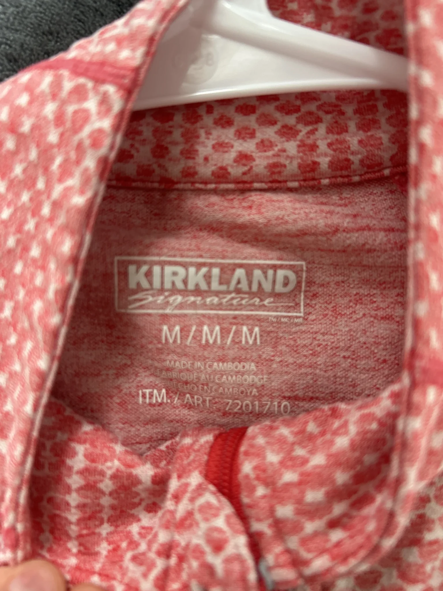 Image for Haut technique Kirkland Signature Demi-Zip – Corail – Taille Médium (M)