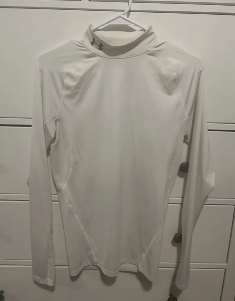 Featured image for Titre : Haut Under Armour HeatGear Compression – Blanc – Taille Médium (M)