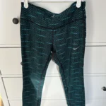 Featured thumbnail for Leggings de Course Nike Dri-FIT Capri – Motif Pois Turquoise – Taille Small – Excellent État