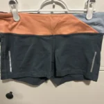 Featured thumbnail for Short de Sport Nike Dri-FIT – Corail & Tri-Gris – Taille Médium – État Impeccab