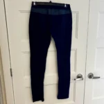 Thumbnail for Stylish navy blue leggings with zips and imitation leather
