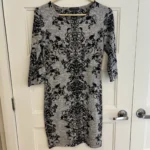 Featured thumbnail for Grey dress with black pattern
