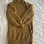 Featured thumbnail for Knitted turtleneck dress