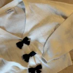Featured thumbnail for Buckle cardigan