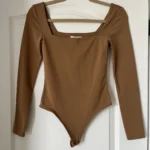 Featured thumbnail for Babaton Aritzia contour bodysuit size S light brown
