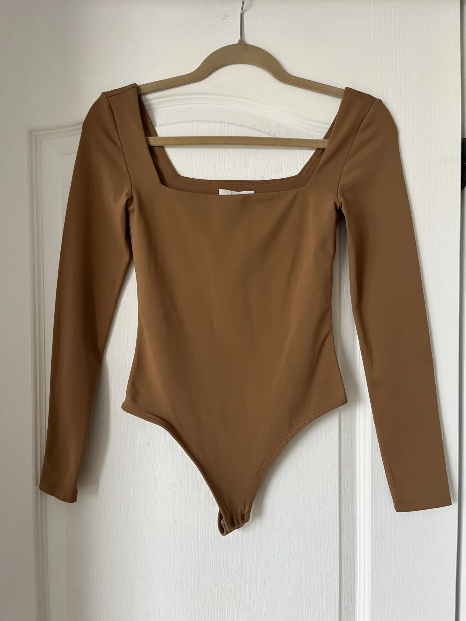 Featured image for Babaton Aritzia contour bodysuit size S light brown