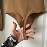 Thumbnail for Babaton Aritzia contour bodysuit size S light brown