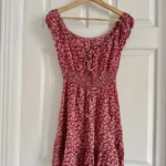 Featured thumbnail for Robe rouge fleurie épaules dénudées