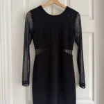 Featured thumbnail for Robe noire manches transparentes détails mesh