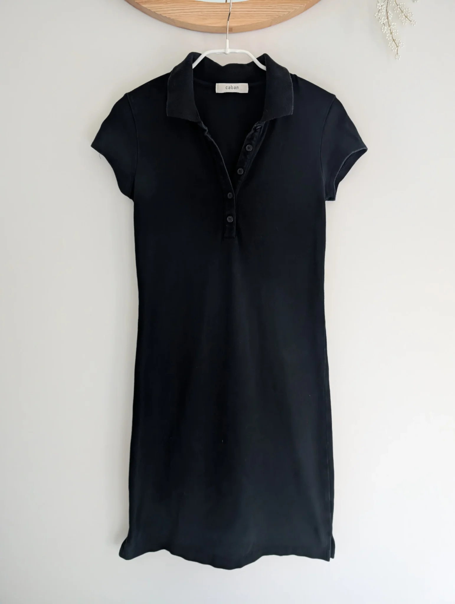 Featured image for Black polo dress