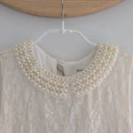 Thumbnail for Lace dress with jewelled collar