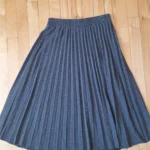 Featured thumbnail for Jupe midi à plis Womance taille élastique